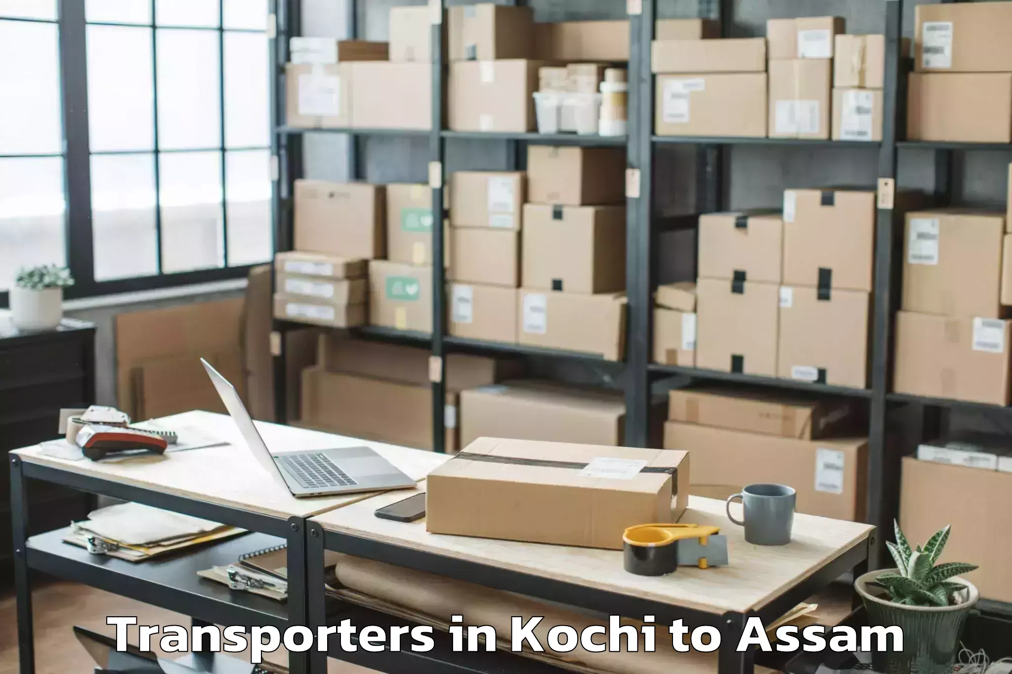 Top Kochi to Sonari Transporters Available